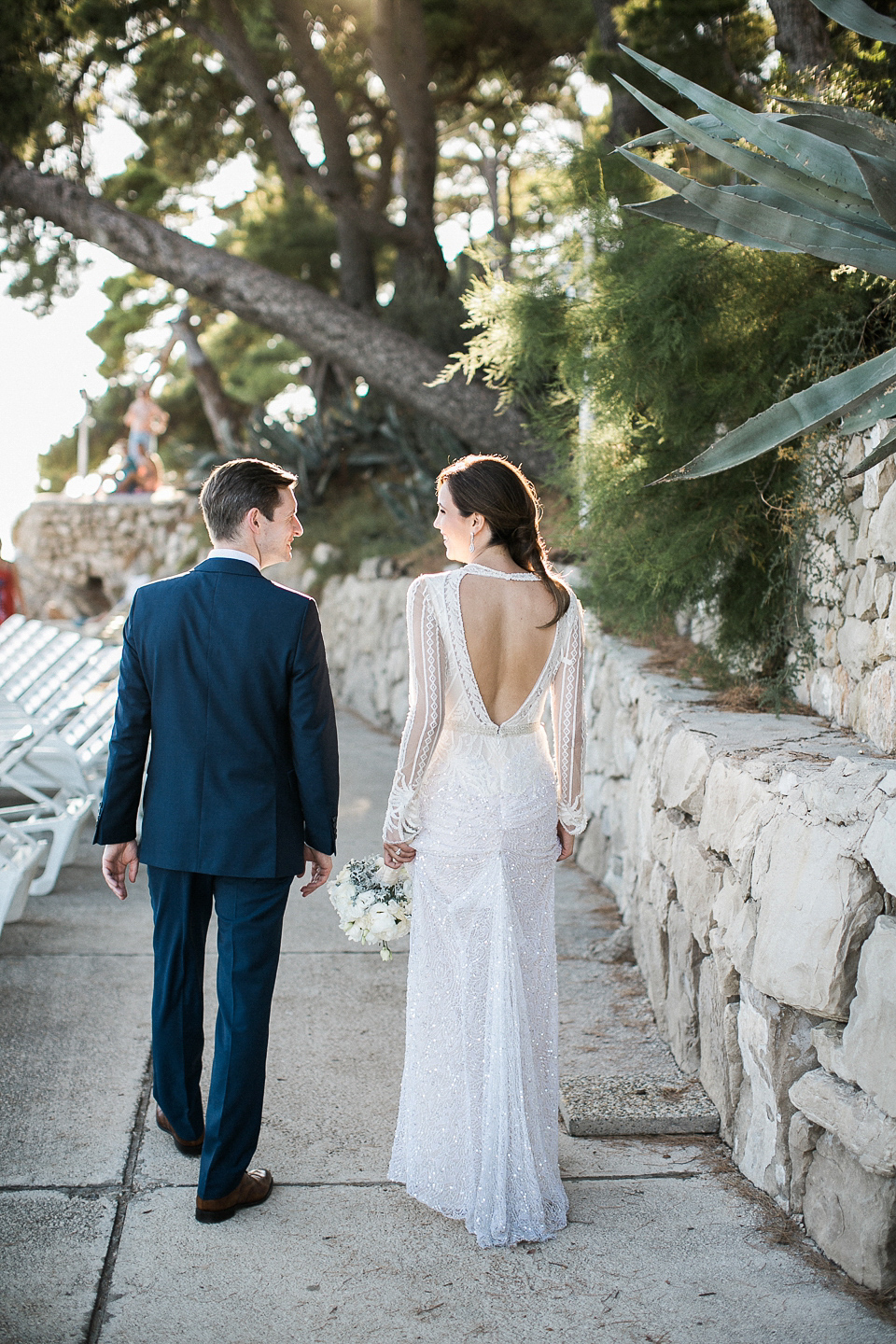 Nataly wore a glamorous Inbal Dror gown for her Midsummer Nights Dream inspired wedding in Croatia. Photography by LIfe Stories Wedding.