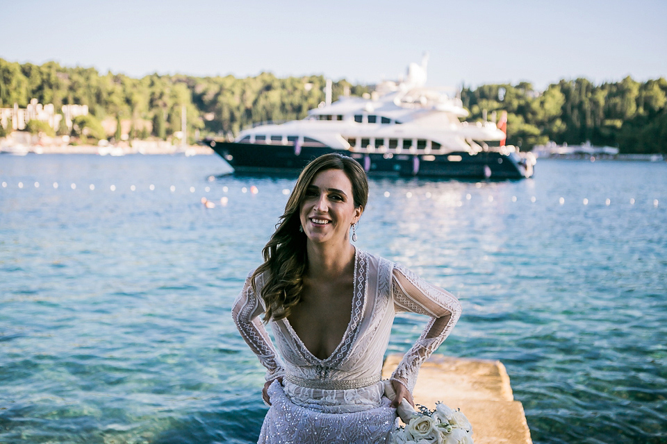 Nataly wore a glamorous Inbal Dror gown for her Midsummer Nights Dream inspired wedding in Croatia. Photography by LIfe Stories Wedding.