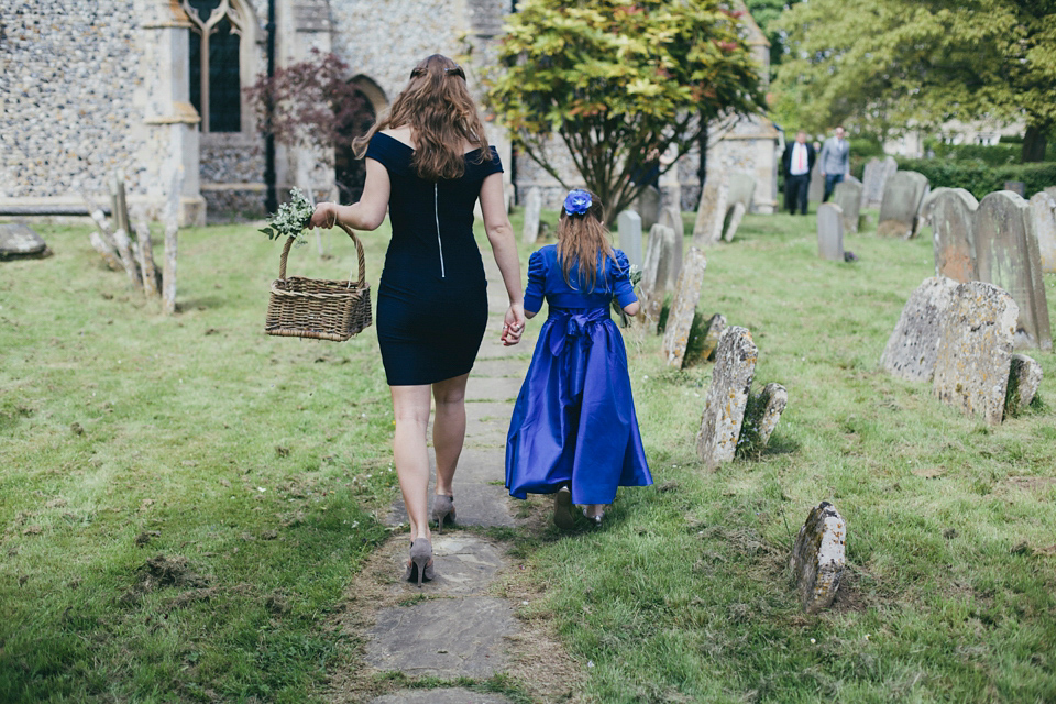 Rah wore a gold sequin wedding dress for her Suffolk barn wedding with a twist. Photography by Emily Brittain.