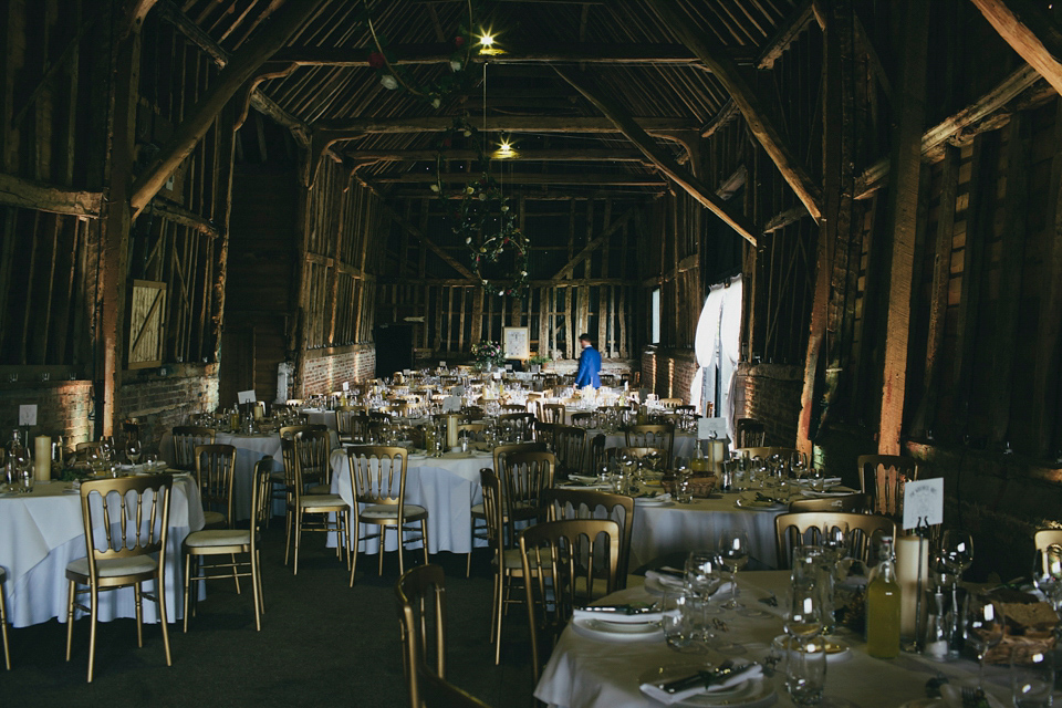 Rah wore a gold sequin wedding dress for her Suffolk barn wedding with a twist. Photography by Emily Brittain.