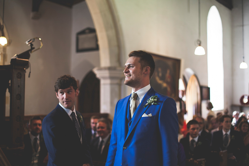 Rah wore a gold sequin wedding dress for her Suffolk barn wedding with a twist. Photography by Emily Brittain.