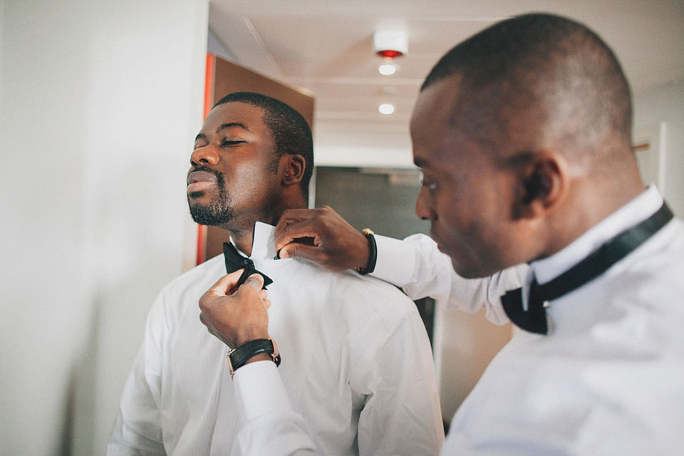 An Essense of Australia gown for a Caribbean Nigerial fusion wedding in London. Photography by Nicholas Lau.