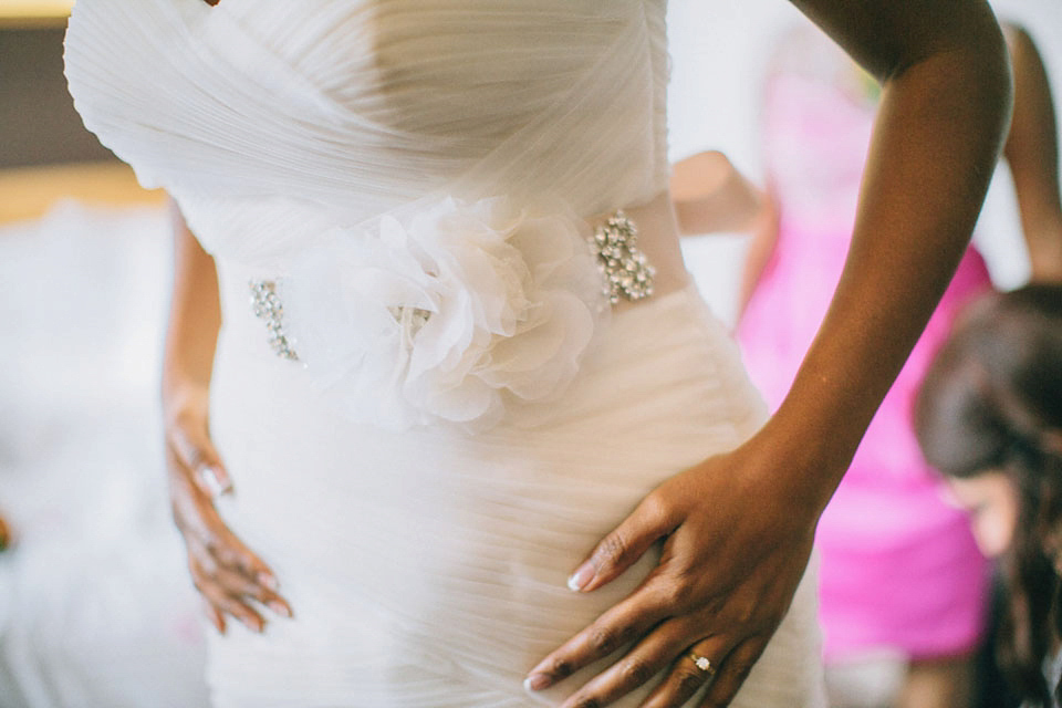 An Essense of Australia gown for a Caribbean Nigerial fusion wedding in London. Photography by Nicholas Lau.