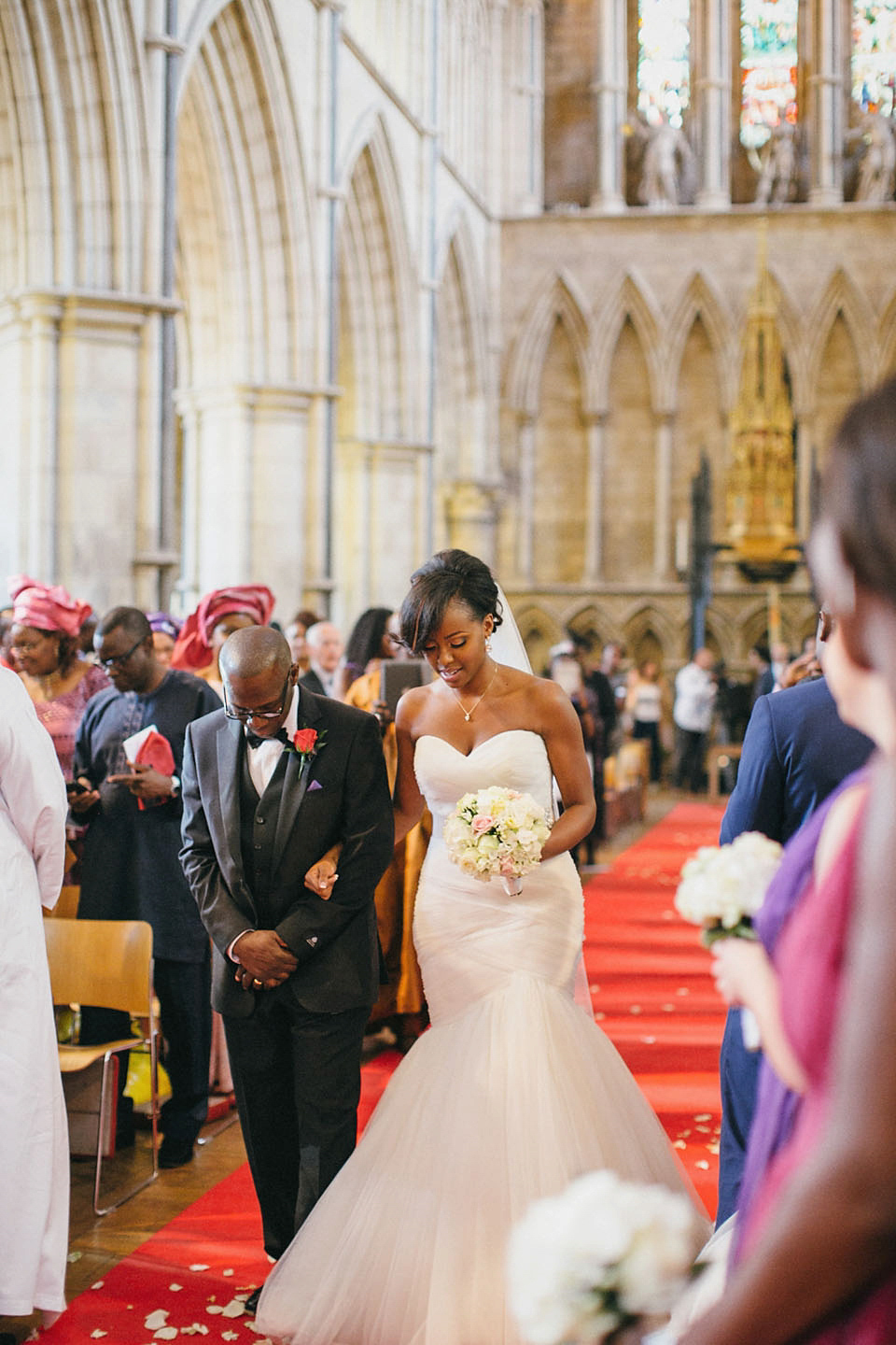 An Essense of Australia gown for a Caribbean Nigerial fusion wedding in London. Photography by Nicholas Lau.