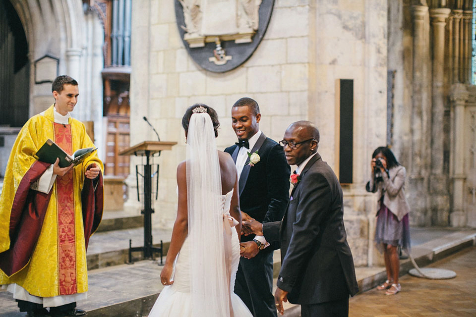 An Essense of Australia gown for a Caribbean Nigerial fusion wedding in London. Photography by Nicholas Lau.