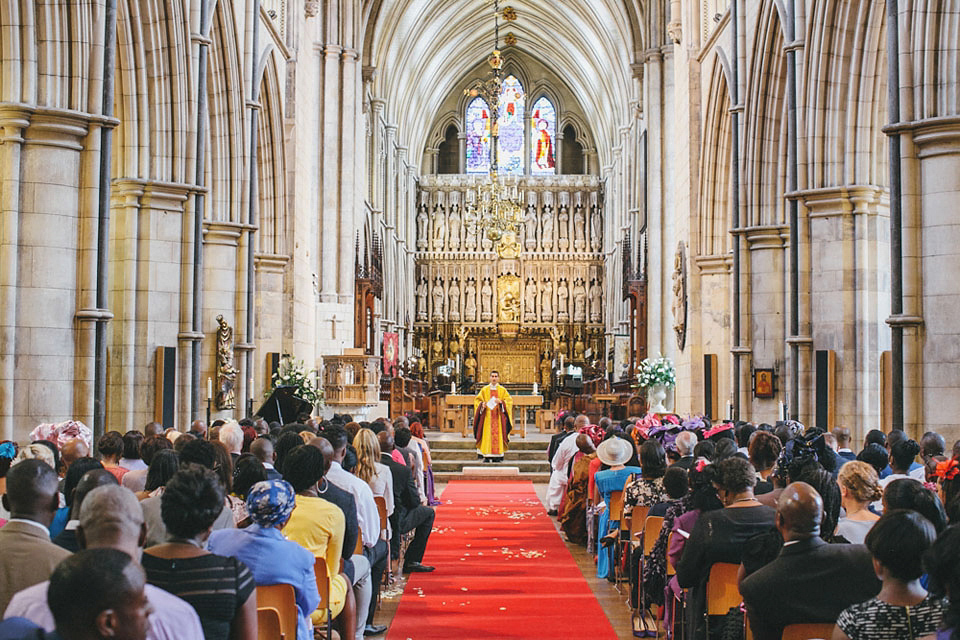 An Essense of Australia gown for a Caribbean Nigerial fusion wedding in London. Photography by Nicholas Lau.