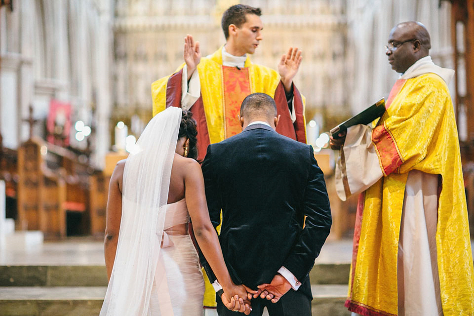 An Essense of Australia gown for a Caribbean Nigerial fusion wedding in London. Photography by Nicholas Lau.