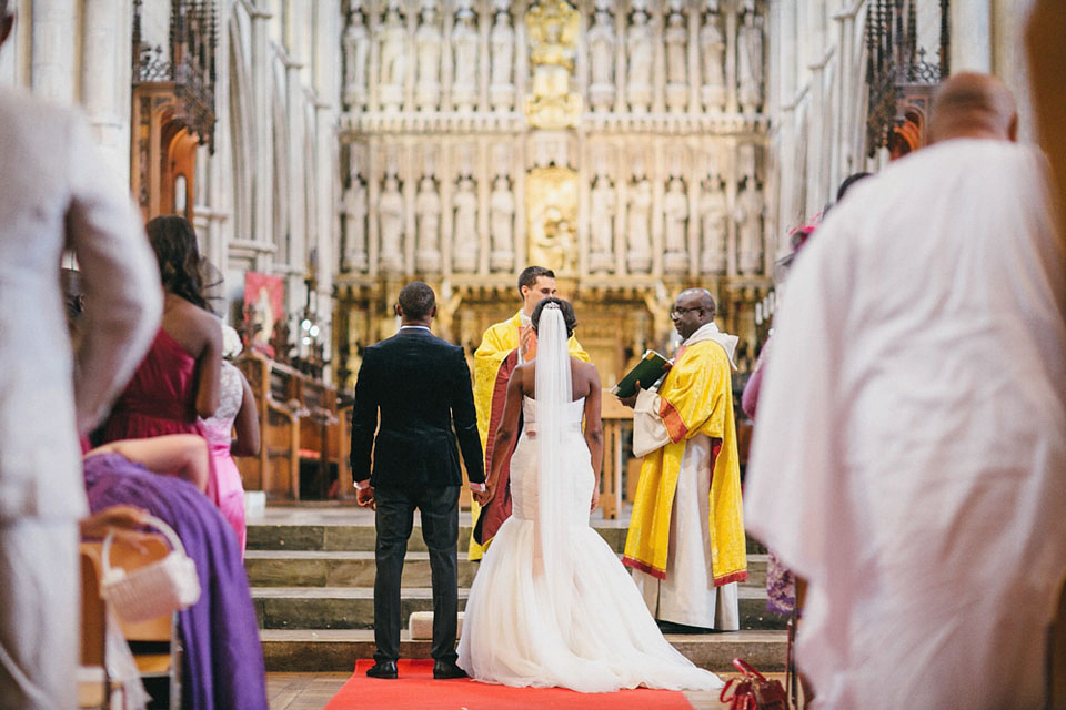 An Essense of Australia gown for a Caribbean Nigerial fusion wedding in London. Photography by Nicholas Lau.