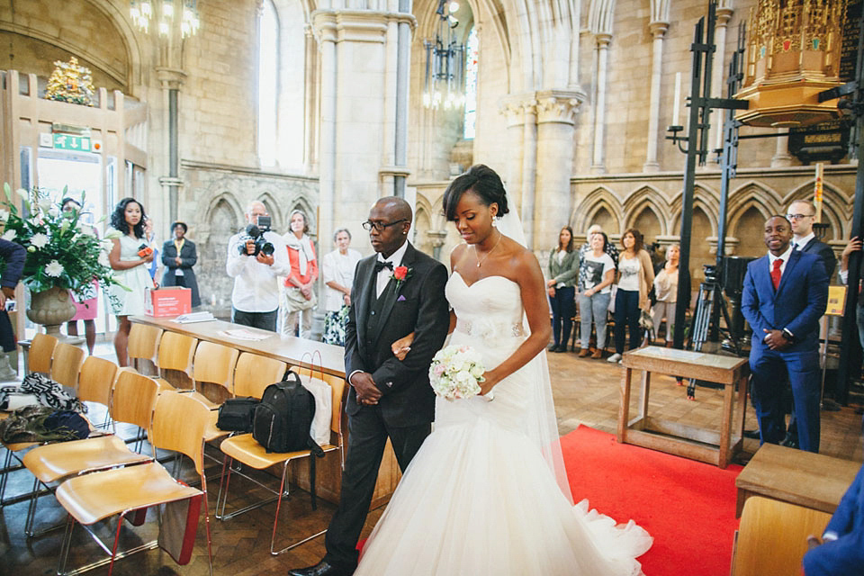 An Essense of Australia gown for a Caribbean Nigerial fusion wedding in London. Photography by Nicholas Lau.