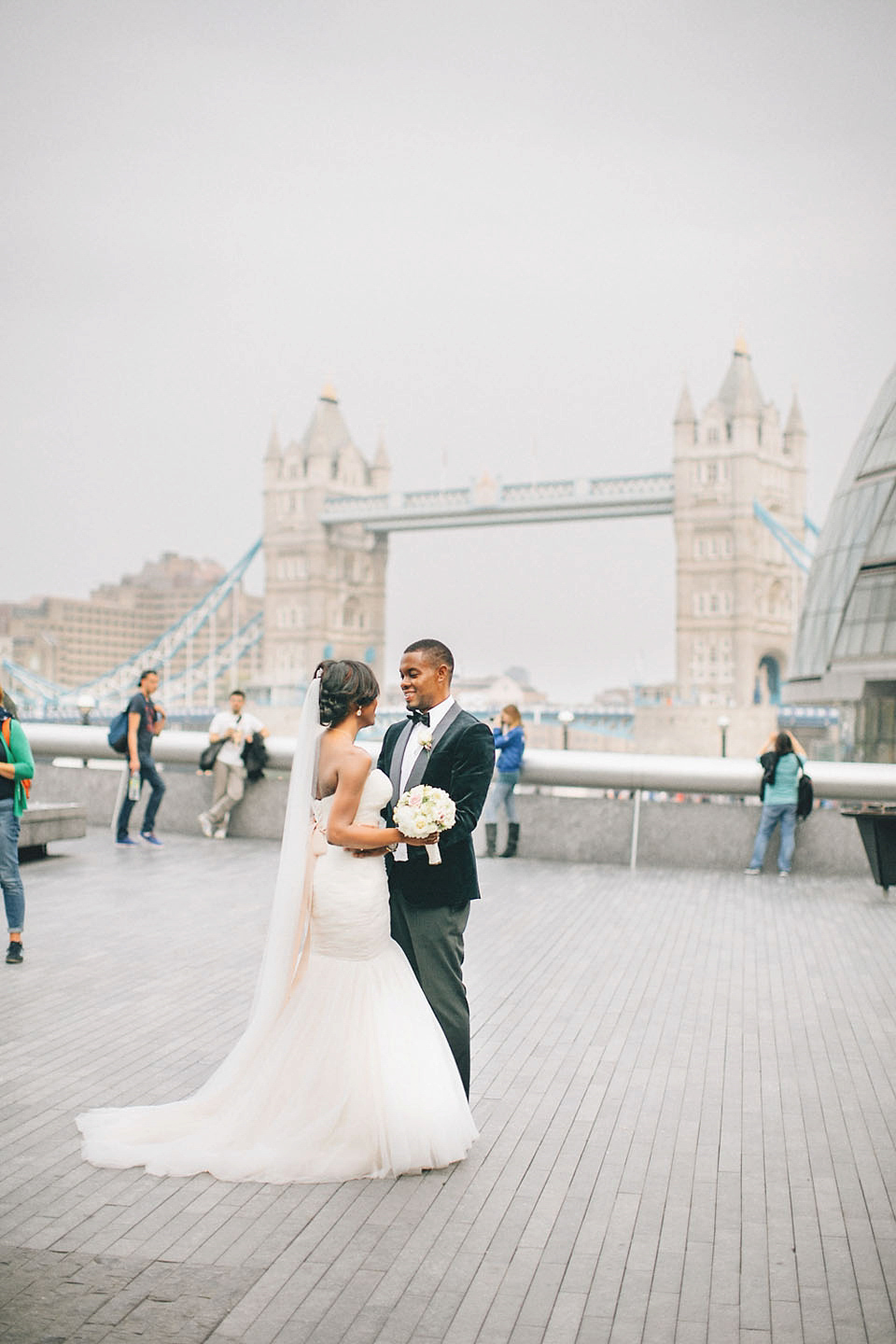 An Essense of Australia gown for a Caribbean Nigerial fusion wedding in London. Photography by Nicholas Lau.