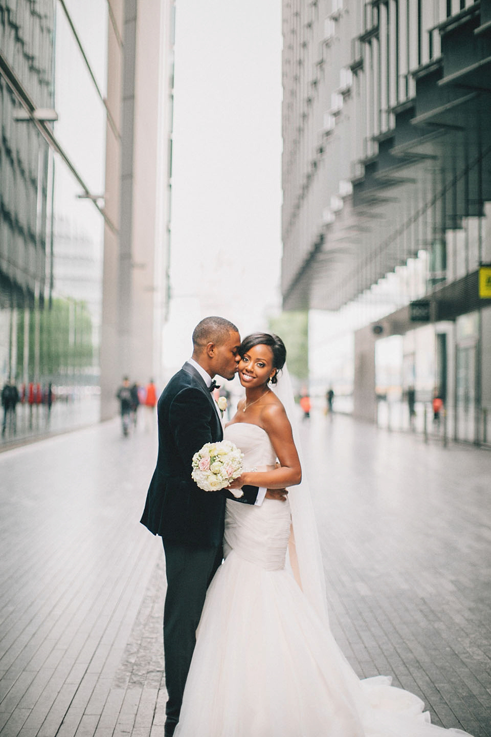 An Essense of Australia gown for a Caribbean Nigerial fusion wedding in London. Photography by Nicholas Lau.