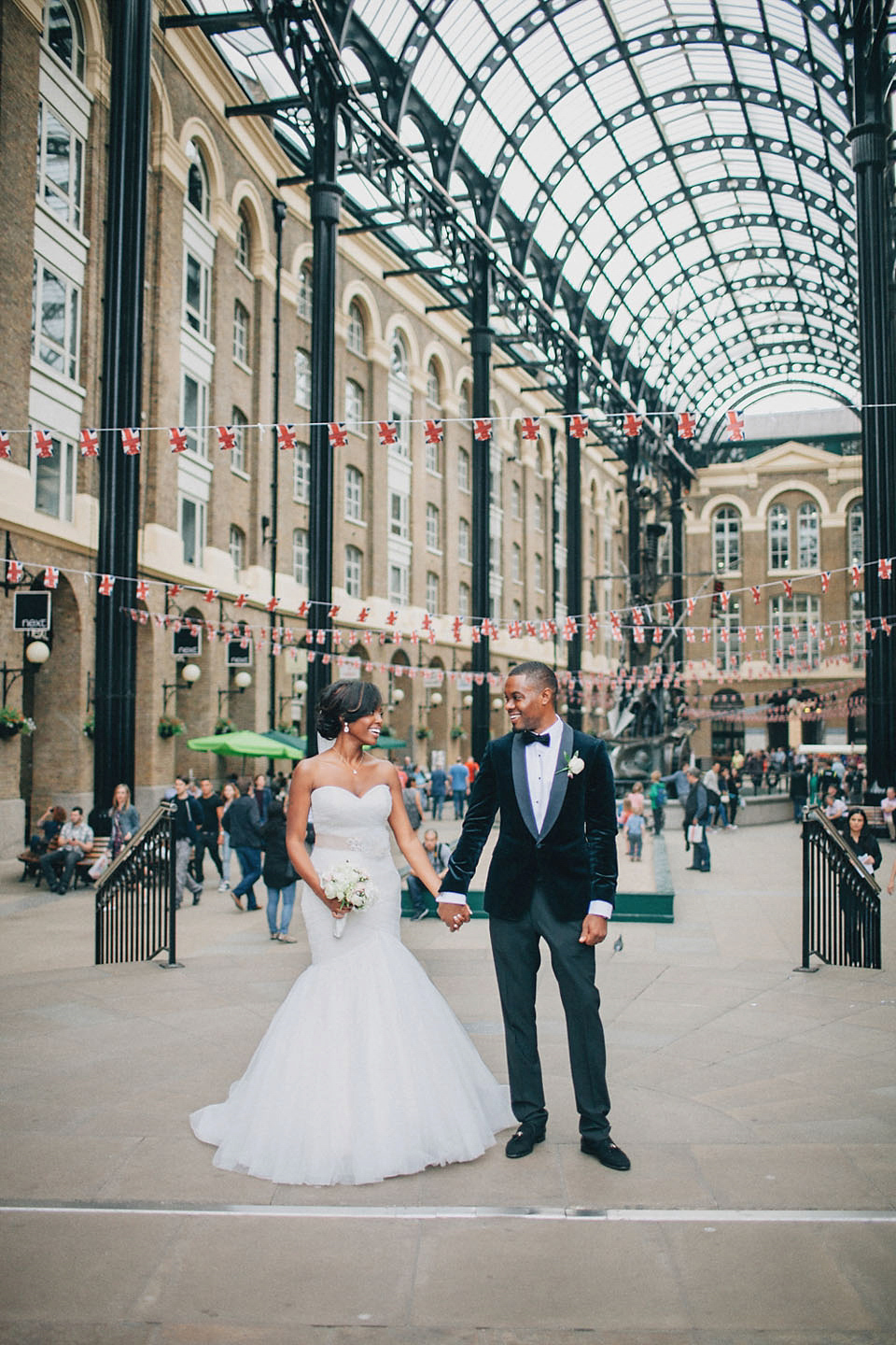 An Essense of Australia gown for a Caribbean Nigerial fusion wedding in London. Photography by Nicholas Lau.