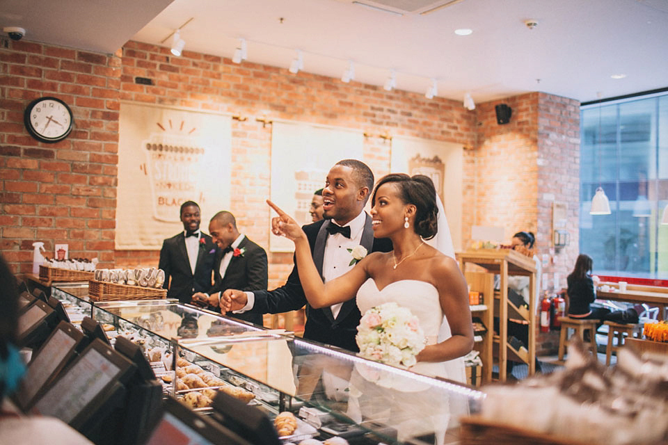 An Essense of Australia gown for a Caribbean Nigerial fusion wedding in London. Photography by Nicholas Lau.