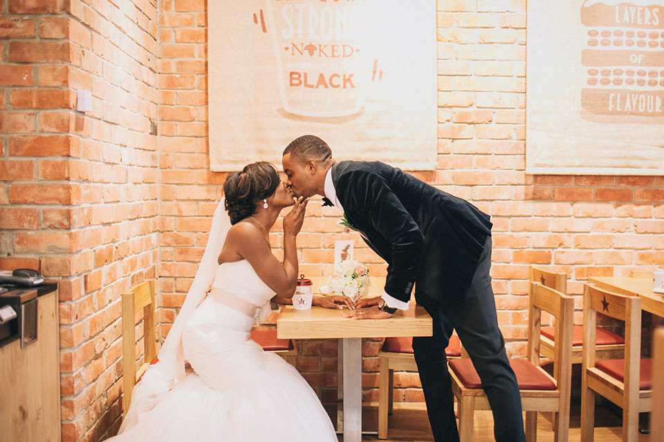 An Essense of Australia gown for a Caribbean Nigerial fusion wedding in London. Photography by Nicholas Lau.