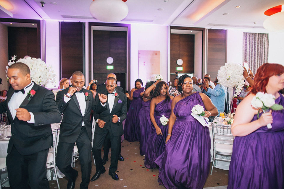 An Essense of Australia gown for a Caribbean Nigerial fusion wedding in London. Photography by Nicholas Lau.