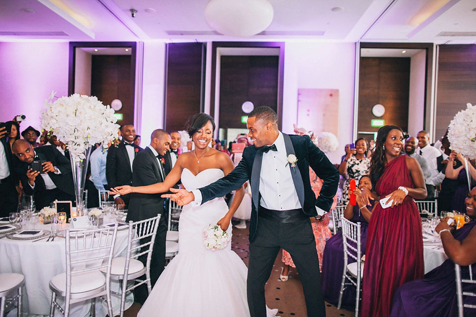 An Essense of Australia gown for a Caribbean Nigerial fusion wedding in London. Photography by Nicholas Lau.