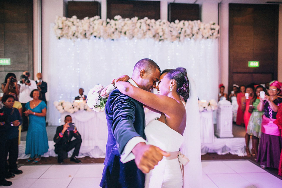 An Essense of Australia gown for a Caribbean Nigerial fusion wedding in London. Photography by Nicholas Lau.