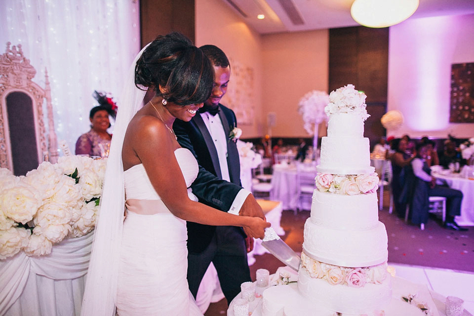 An Essense of Australia gown for a Caribbean Nigerial fusion wedding in London. Photography by Nicholas Lau.