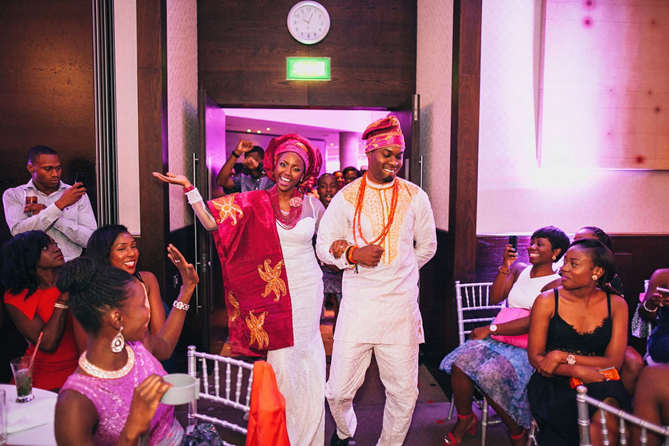 An Essense of Australia gown for a Caribbean Nigerial fusion wedding in London. Photography by Nicholas Lau.