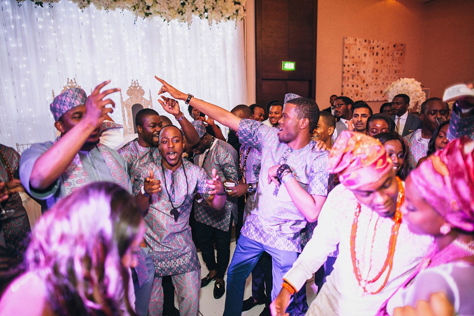 An Essense of Australia gown for a Caribbean Nigerial fusion wedding in London. Photography by Nicholas Lau.