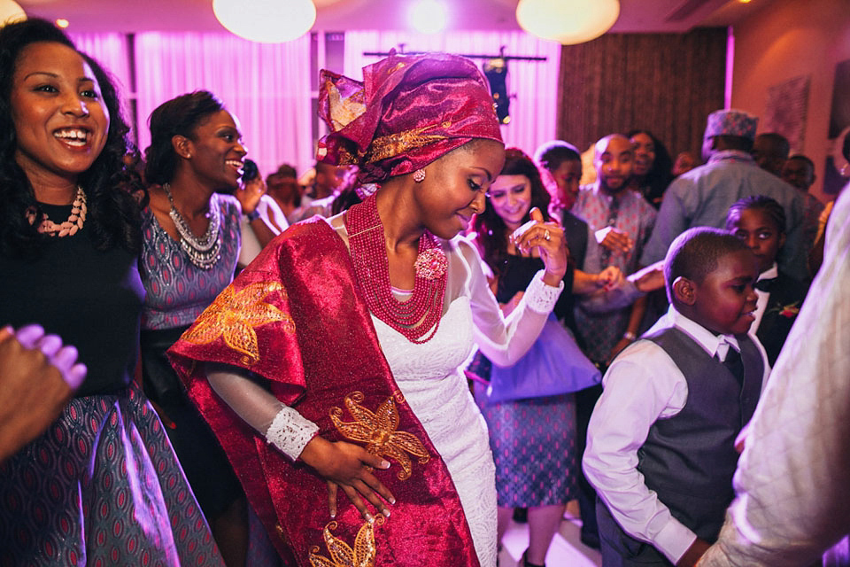 An Essense of Australia gown for a Caribbean Nigerial fusion wedding in London. Photography by Nicholas Lau.