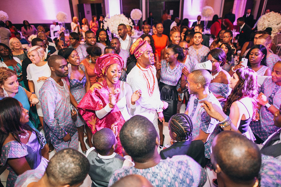 An Essense of Australia gown for a Caribbean Nigerial fusion wedding in London. Photography by Nicholas Lau.