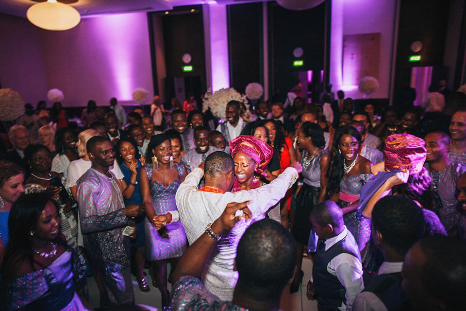 An Essense of Australia gown for a Caribbean Nigerial fusion wedding in London. Photography by Nicholas Lau.