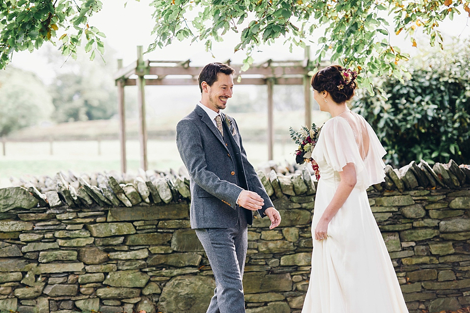 Rebeca wore a Jenny Packham gown for her homemade, Autumn wedding in the Lake District. Photography by Jessica Reeve.