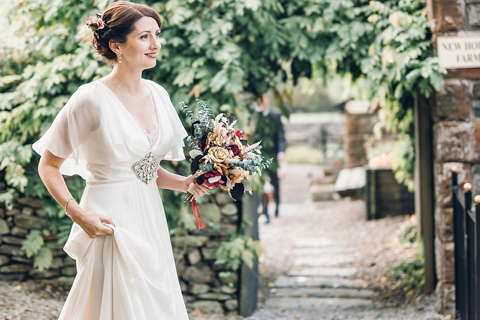 Rebeca wore a Jenny Packham gown for her homemade, Autumn wedding in the Lake District. Photography by Jessica Reeve.