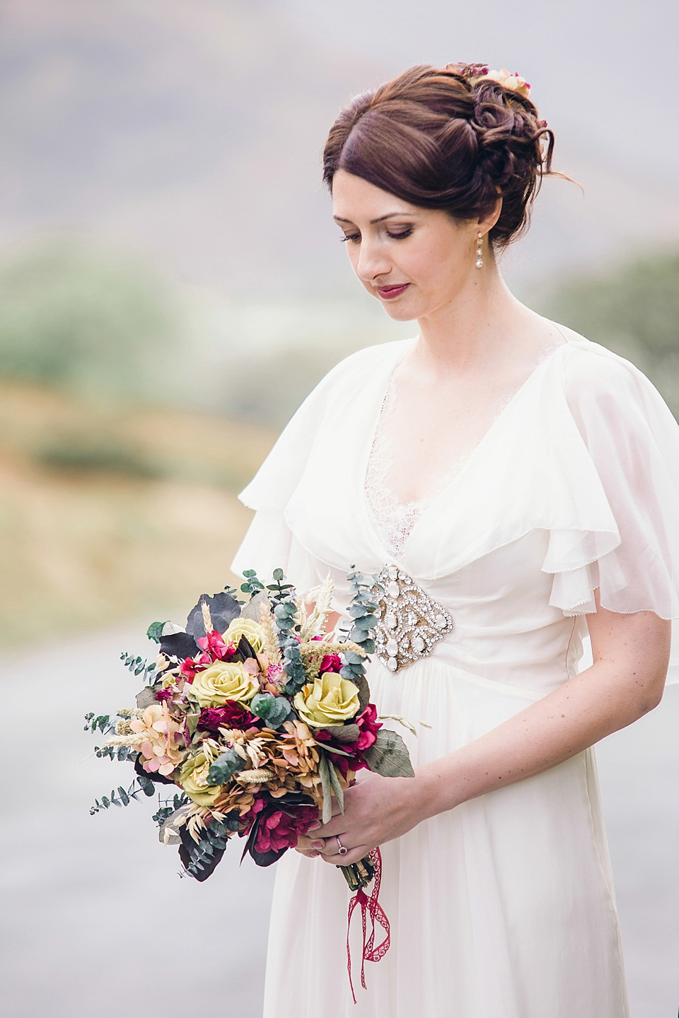 Rebeca wore a Jenny Packham gown for her homemade, Autumn wedding in the Lake District. Photography by Jessica Reeve.