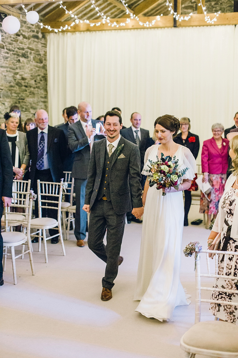 Rebeca wore a Jenny Packham gown for her homemade, Autumn wedding in the Lake District. Photography by Jessica Reeve.