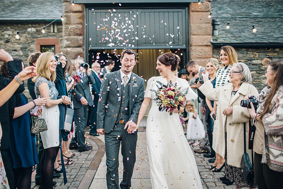 Rebeca wore a Jenny Packham gown for her homemade, Autumn wedding in the Lake District. Photography by Jessica Reeve.