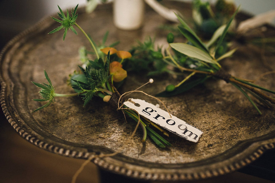 Bride Hannah wore a delicate lace gown by designer Jane Bourvis for her rustic and whimsical woodland wedding. Photography by Red on Blonde.