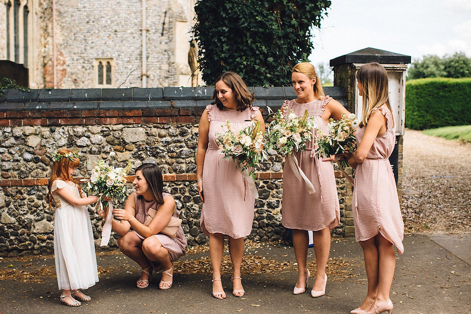 Bride Hannah wore a delicate lace gown by designer Jane Bourvis for her rustic and whimsical woodland wedding. Photography by Red on Blonde.