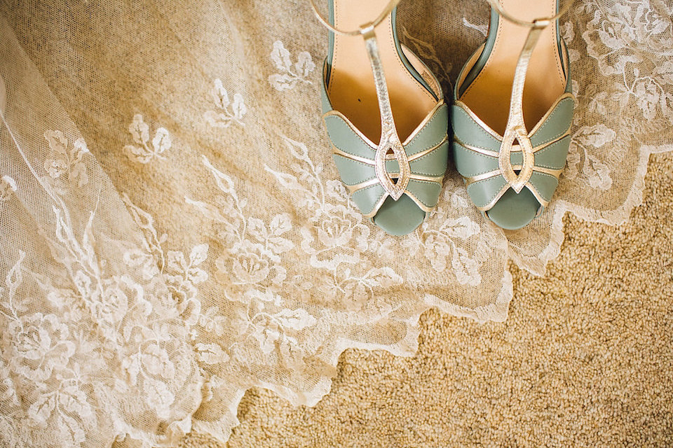 Bride Hannah wore a delicate lace gown by designer Jane Bourvis for her rustic and whimsical woodland wedding. Photography by Red on Blonde.