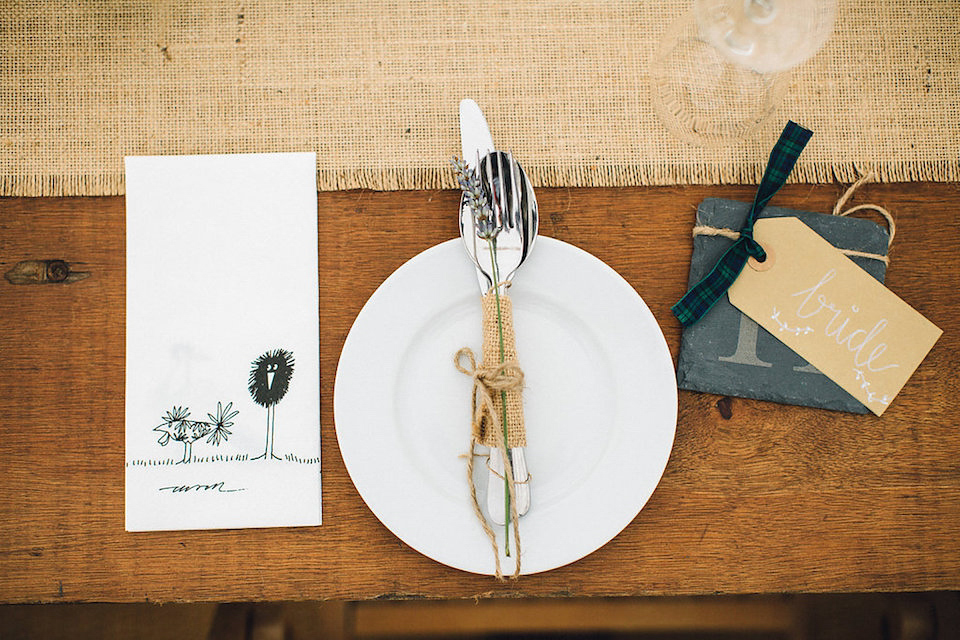 Bride Hannah wore a delicate lace gown by designer Jane Bourvis for her rustic and whimsical woodland wedding. Photography by Red on Blonde.