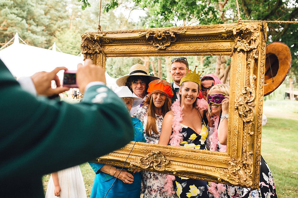 Bride Hannah wore a delicate lace gown by designer Jane Bourvis for her rustic and whimsical woodland wedding. Photography by Red on Blonde.