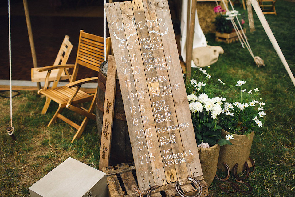 Bride Hannah wore a delicate lace gown by designer Jane Bourvis for her rustic and whimsical woodland wedding. Photography by Red on Blonde.