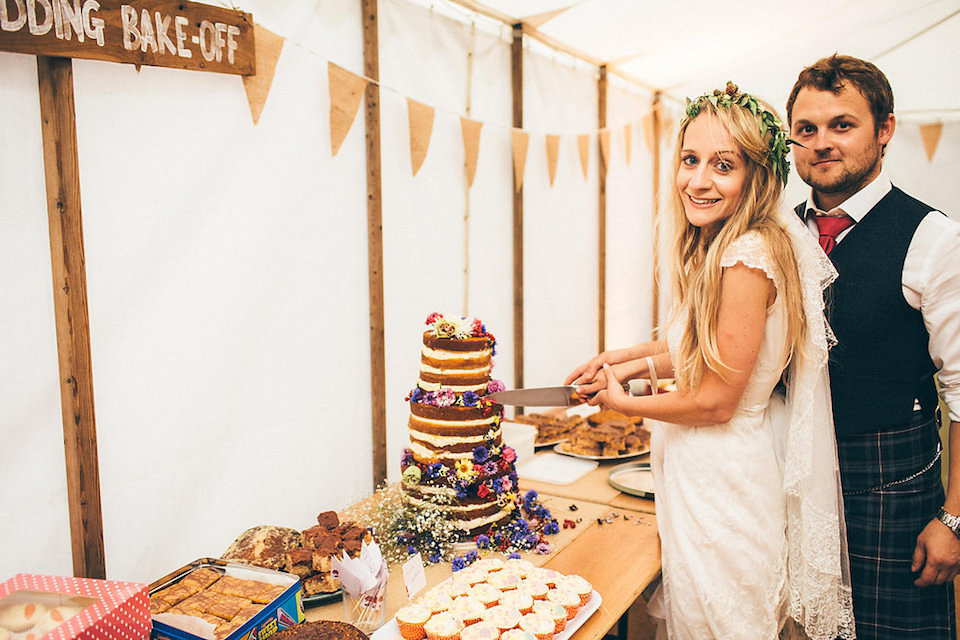 Bride Hannah wore a delicate lace gown by designer Jane Bourvis for her rustic and whimsical woodland wedding. Photography by Red on Blonde.