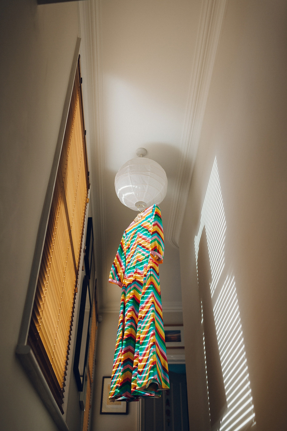 Megan wears a colourful rainbow Valentino gown for her cool and quirky London pub wedding. Photography by Lee Garland.