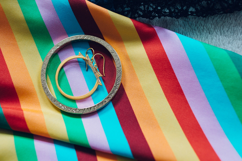 Megan wears a colourful rainbow Valentino gown for her cool and quirky London pub wedding. Photography by Lee Garland.