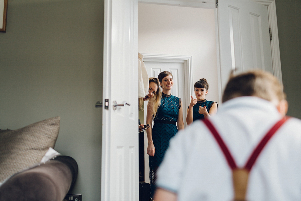 Megan wears a colourful rainbow Valentino gown for her cool and quirky London pub wedding. Photography by Lee Garland.