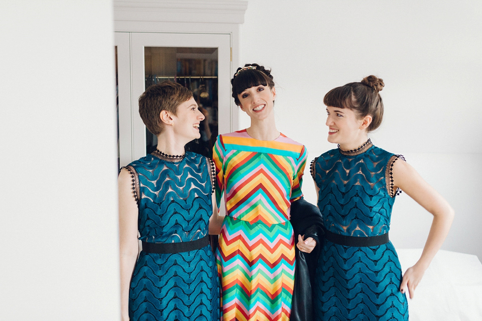 Megan wears a colourful rainbow Valentino gown for her cool and quirky London pub wedding. Photography by Lee Garland.