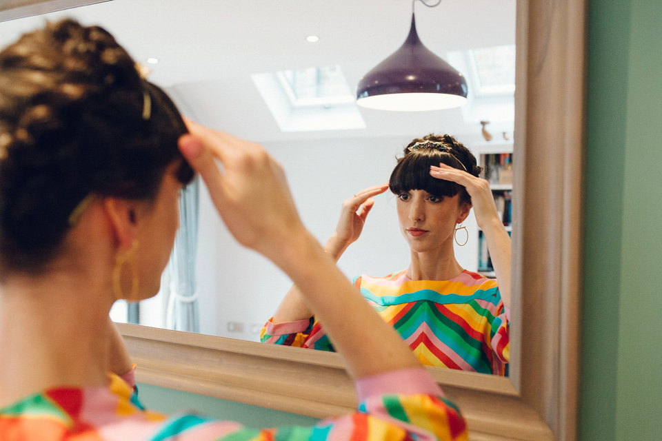 Megan wears a colourful rainbow Valentino gown for her cool and quirky London pub wedding. Photography by Lee Garland.