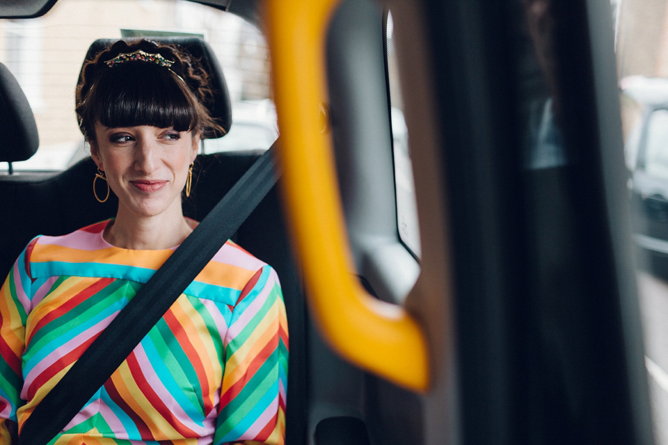 Megan wears a colourful rainbow Valentino gown for her cool and quirky London pub wedding. Photography by Lee Garland.