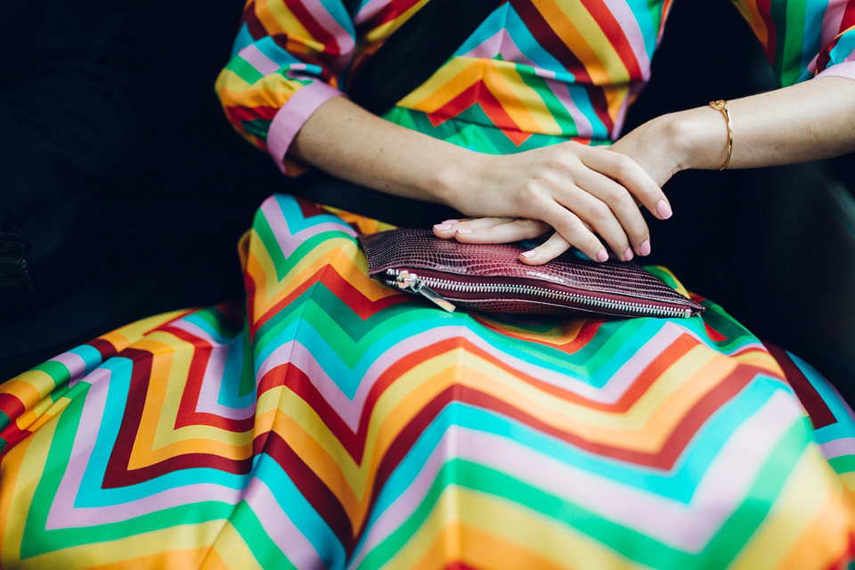 Megan wears a colourful rainbow Valentino gown for her cool and quirky London pub wedding. Photography by Lee Garland.