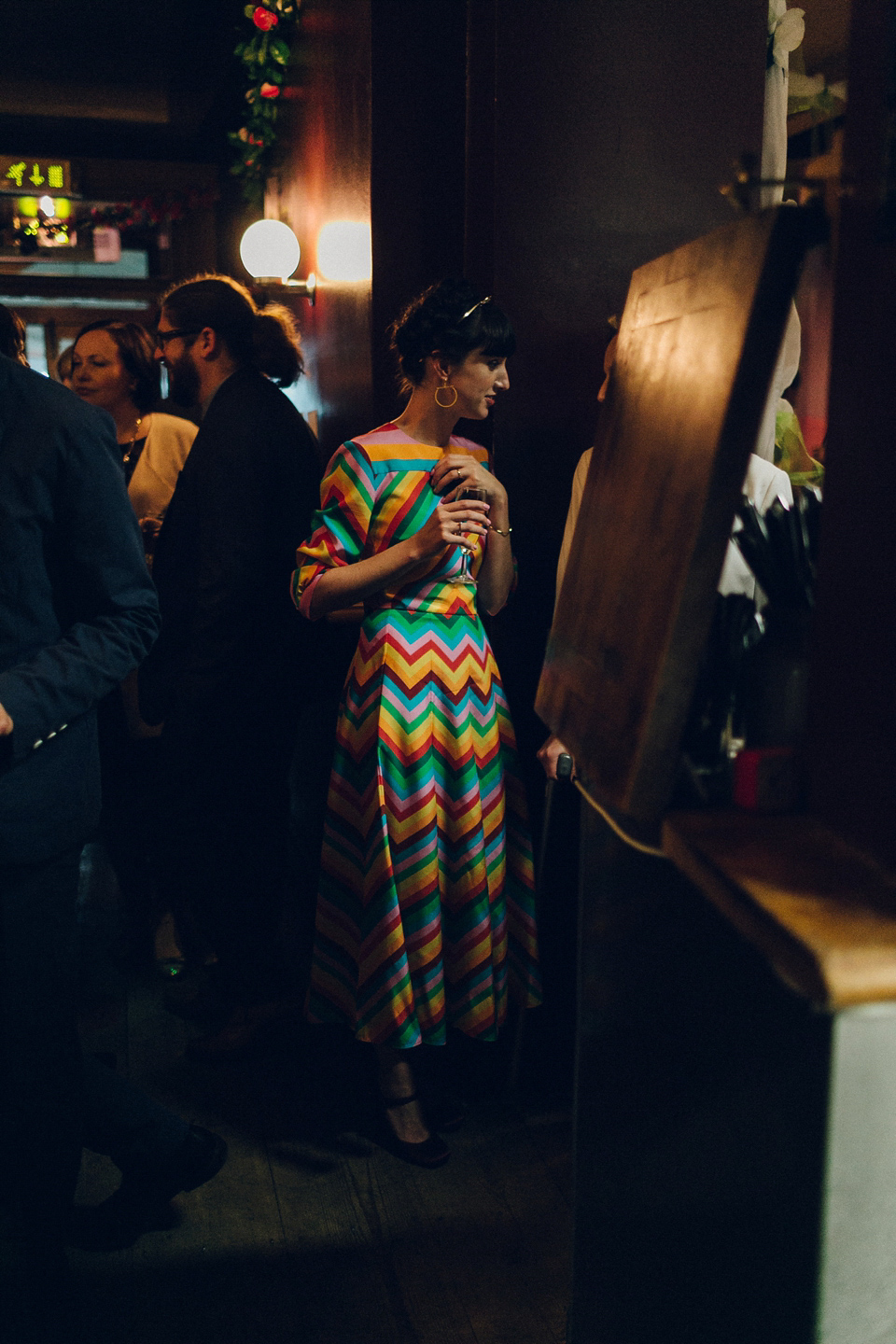 Megan wears a colourful rainbow Valentino gown for her cool and quirky London pub wedding. Photography by Lee Garland.