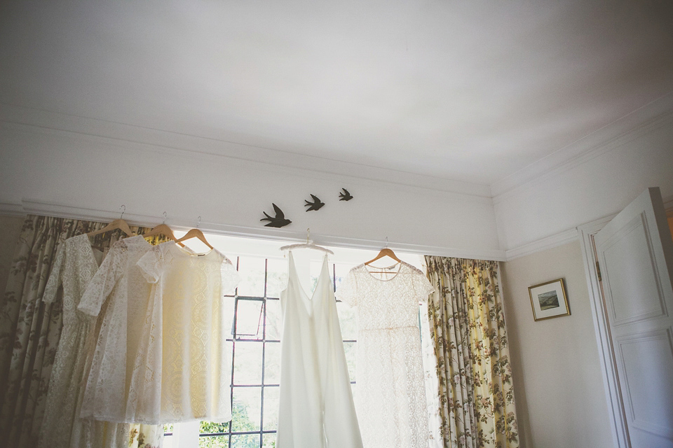 Kat wore an Oxfam wedding dress for her laid back and homemade wedding in her Mum's back garden. Photography by India Hobson.