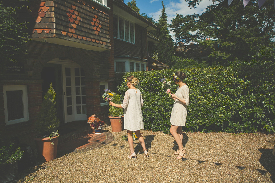 Kat wore an Oxfam wedding dress for her laid back and homemade wedding in her Mum's back garden. Photography by India Hobson.