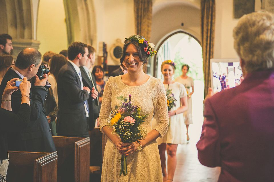 Kat wore an Oxfam wedding dress for her laid back and homemade wedding in her Mum's back garden. Photography by India Hobson.